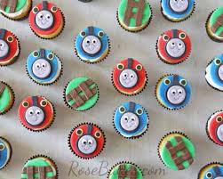 We absolutely love this idea from flickr user cecy trejo. Thomas The Train Cupcakes Rose Bakes