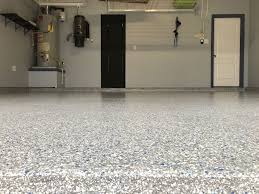 Classic Finish Flake Floor In Moonstone With Dark Blue And Powder Blue In The Marshall Ridge Subdi Garage Floor Epoxy Floor Coating Epoxy Garage Floor Coating