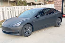 Matte Black Tesla Model 3 Stunning Photos Wrap Cost And Info Tesla Tesla Model Tesla Model X