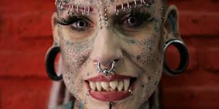 Vampire woman, who prefers to be called Jaguar Woman, got her first tattoo  at 14