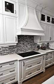 Recommended for walls and exteriors, these tiles. David Nosella Interior Design Gorgeous Kitchen With Crisp White Kitchen Cabinets White Kitchen Backsplash Kitchen Design Black And White Backsplash