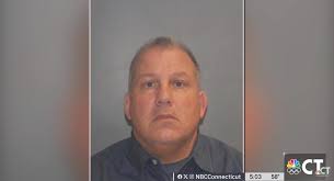 Connecticut off-duty cop Allen Ganter punches driver in traffic for honking  at him at red light: 'What are you doing?'