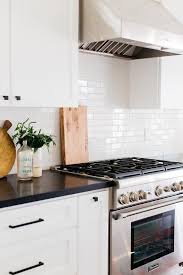 Welcome to the cabinet pulls store, where you'll find great prices on a wide range of different cabinet pulls for your home. Black Counters With White Subway Tiles Transitional Kitchen