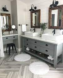 Modern farmhouse bathroom features a pedestal sink and deep soaking tub clad in gray brick tiles that complement the limestone flooring. Pin On Bathroom Ideas