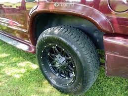 The tires it has on it are trail guide all terrains. 2002 Dodge Durango Wheel Offset Aggressive 1 Outside Fender Stock 735173 Team Stance
