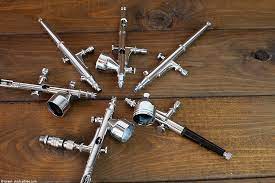 Using an airbrush gun involves pushing down the trigger and then pulling it back in varying degrees to excrete the paint at different line widths. Airbrush Guide Helpful Tips And Tricks For Airbrushing