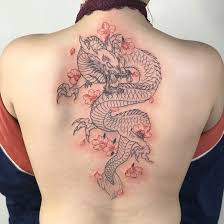 The cherry blossom, also known as sakura, is one of japan's most enduring cultural icons and often part of traditional japanese tattooing. Dragon And Cherry Blossom Art Artist Artistic Tattooarist 9 9dragons 9dragonsink Dragon Tattoo With Flowers Dragon Tattoo For Women Dragon Thigh Tattoo