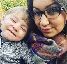 Boy dressed as mini guardsman greets the real deal