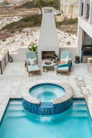 Inviting Outdoor Space With Fireplace Hot Tub And Pool Pool Houses Swimming Pools Backyard Pool Patio