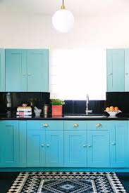 Turquoise Blue Kitchen With Black Countertops And Backsplash Contemporary Kitchen Black Kitchen Decor Turquoise Kitchen Cabinets Teal Kitchen Cabinets