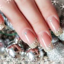 stun with some sparkle for your next christmas or new year s eve party get in the spirit with this festi french tip manicure star nail art glitter french tips