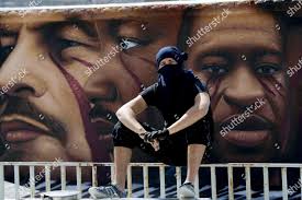 Italian Street Artist Jorit Agoch Poses: редакционная стоковая фотография —  стоковое изображение