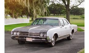 Image result for Dagestan Blue 1928 Oldsmobile