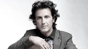 El cantante coti en una foto. Biografia De Coti