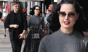 However, she is also known not because of her career but also he is mostly known as a girlfriend of a famous musician marilyn manson, who was not only dita von teese boyfriend but also her husband. Dita Von Teese Looks Sensational In A Polka Dot Skirt As She Shops With Boyfriend Adam Rajcevich Daily Mail Online