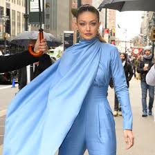 Gigi hadid wears powder blue jumpsuit and matching cape at. Gigi Hadid Wears Blue Emilia Wickstead Caped Jumpsuit To Variety S Power Of Women In Nyc
