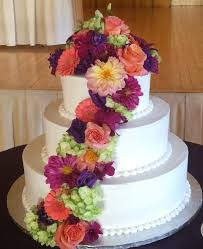 50 little details that'll take your wedding to the next level. Colorful Cascading Cake Flowers Weddings Events