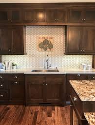 Trends From The Tour Herringbone Hexagons And Terracotta Schneiderman S The Blog Design And Decorating Dark Wood Kitchen Cabinets Backsplash With Dark Cabinets Brown Kitchen Cabinets