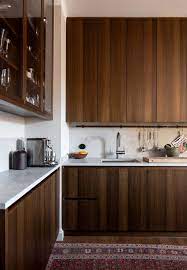 Walnut Kitchen Cabinets And An Eclectic
