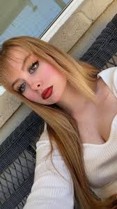 Blonde hair with pink highlights