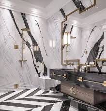 The marble is white with gray veining while the floor is black tile. Gorgeous Black And White Marble Bathrooms You Won T Be Able To Resist