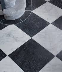 Completed with chrome fixtures, this black and white bathroom is undoubtedly elegant. Antique Black And White Chequer Marble