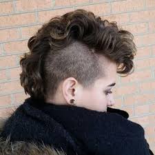 The mohawk (also referred to as a mohican) is a hairstyle in which, in the most common variety, both sides of the head are shaven, leaving a strip of noticeably longer hair in the center. Girl Mohawk Hairstyle Best Hairstyles
