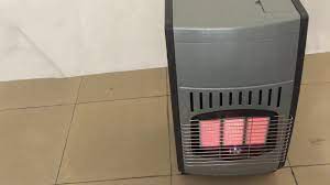 Press inward on the valve. How To Switch Off A Qlima Gas Heater Model Gh 3042 R Gh 3062 Rf Youtube