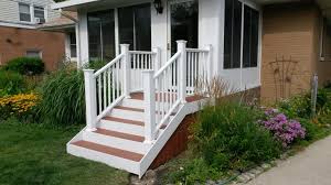 Paired with the right balusters, this type of handrail can be the perfect option for an entryway staircase. Menards Ultradeck Stairs In The Rustic Style With Redwood Color Accent Westchester Il Porch Steps Rustic Style Stairs