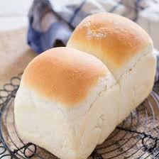 Shokupan Is Soft And Fluffy Japanese White Bread Made By The Yudane Method Hokkaido Milk Bread Is Made By The Same Method Bread Japanese Bread Recipes