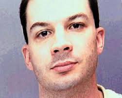 Authorities: Officers killer was ex-con in stolen SUV