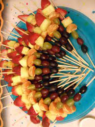 By jen wheeler | looking for a way to liven up your taco tuesday—or any summer dinner? Pin By Mauze Kittycat On My Creations 80s Party Foods 70s Dinner Party Rainbow Fruit Kabobs