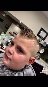 A little Ricky Vaughn hair cut for Logan!!!