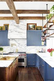 Mable Clad Hood Blue Cabinets Brooklyn Decker S Eclectic Texas Home Turns On The Charm Mydomaine Home Shabby Chic Kitchen Chic Kitchen