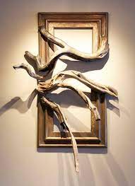 L Arte Nell Abbraccio Tra Una Cornice E Un Tronco D Albero Arte Delle Pareti In Legno Arte Per Pareti Fai Da Te Cornici