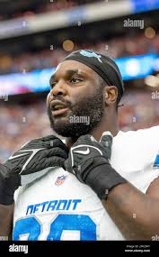 Detroit Lions defensive lineman DJ Reader (98) stands for the National  Anthem before playing against the Arizona Cardinals in an NFL football  game, Sunday, Sept. 22, 2024, in Glendale, Ariz. Lions defeated