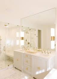 Gold bathroom tiles 2021 it is very trendy now to use gold bathroom tiles to turn a simple bathroom into something very innovative and fashionable. 25 Refined White And Gold Bathrooms Digsdigs
