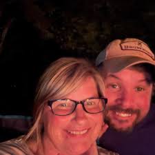 Looking to sell a woman's silver necklace with silver butterfly pendant and  a stainless steel dad's ring asking $80 for both.