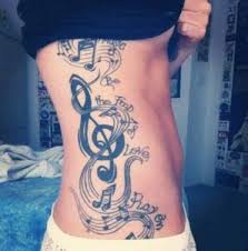 The first category usually comprises musical notes and headphones combined with other visually alluring elements like roses, ribbons, hearts, compact cassettes and so on. 120 Eye Catching Music Note Tattoo New Ideas For 2021