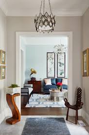 World Traveler S Eclectic Foyer With Unique One Of A Kind Collection Gallery Hallway Living Foyer Modern Interior Design Portfolios Interior Home Decor
