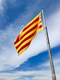 Flag waving in the wind in sunny day. Hd Wallpaper Photo Of Raised Yellow And Red Horizontal Striped Flag Banner Wallpaper Flare