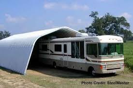 Don't assume that because it is labeled as an rv garage plan that the ceiling is automatically high enough to accept your 36' fifth wheel with a rooftop ac unit! Rv Garage Buildings Rv Storage Buildings Online Prices