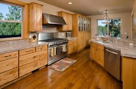 This chic and polished kitchen is full of stunning woodwork, both in this lovely kitchen has deep red hues in the dark wood flooring. Dark Wood Floor Ideas Kitchen 5 Savillefurniture