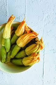 A zucchini has ber when the end of the veggie is soft and looks like it is rotting. Sauteed Zucchini Blossoms With Herbed Ricotta Meg Is Well