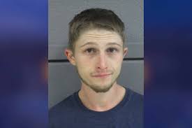 Man arrested for allegedly firing shots at the ceiling of his Fayette  Street home