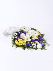 We answer your funeral flower etiquette questions. Funeral Flower Arrangements Flowers For Funerals Interflora