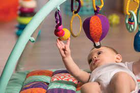 The legs are embroidered with colored designs. Wonders Above Baby Play Mat Baby B B Toys