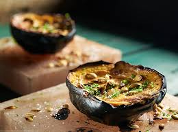 Place the slices on the grill over the hot coals, or the hot side of a gas grill, and cook them, turning with tongs every few minutes, until they're deep brown, or just beginning to char. Smoked Acorn Squash With Parmesan Flan Barbecuebible Com