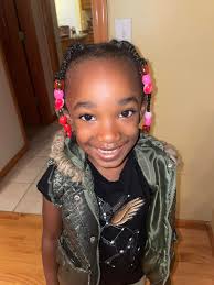 Showcasing 12-year-old daughter's braided hair