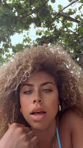 I'm just minding my biz chilling at the beach…